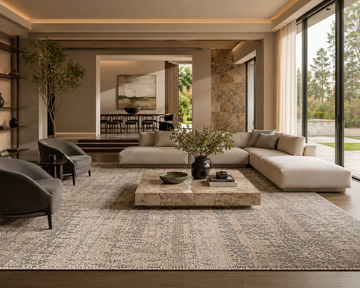 Luxury living room showing correct rug size placement beneath furniture for interior design inspiration.