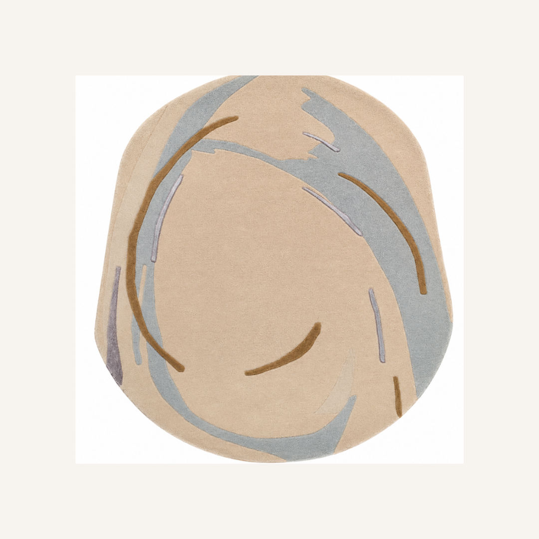 Contemporary round abstract rug styled in a luxury modern living room interior
