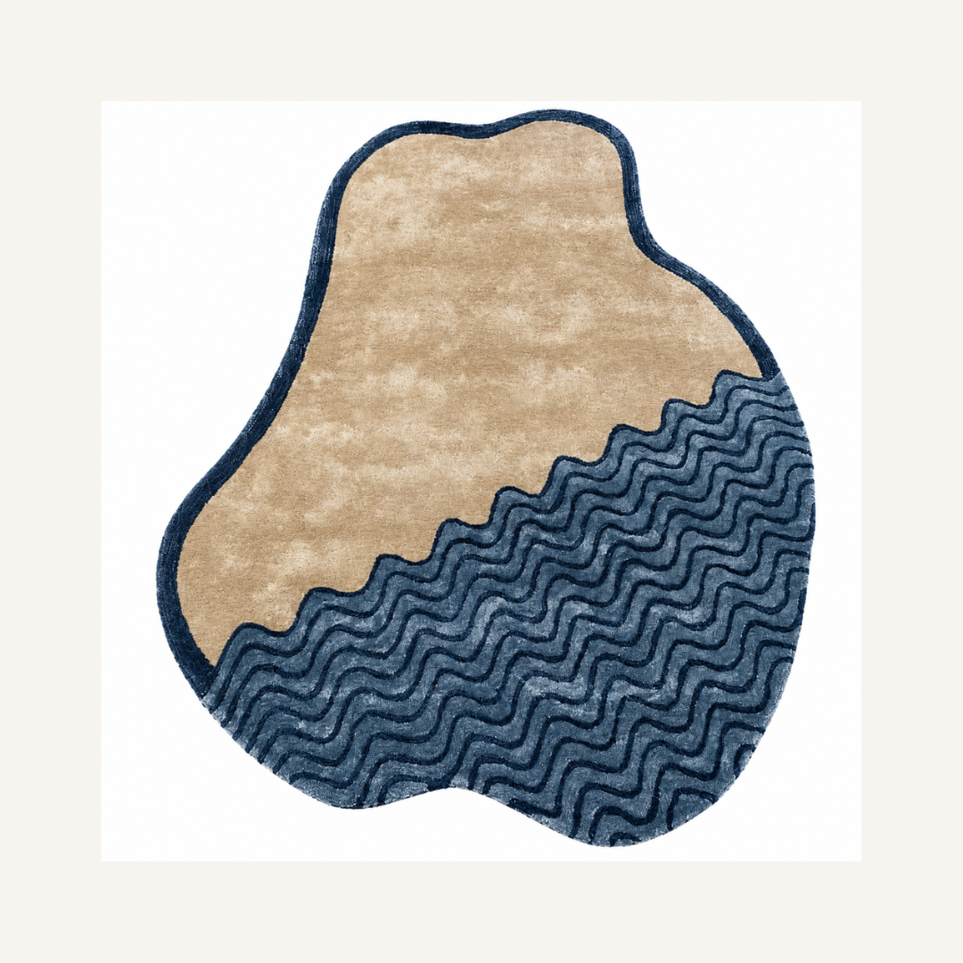 Modern organic wave designer rug styled in a luxury contemporary living room
