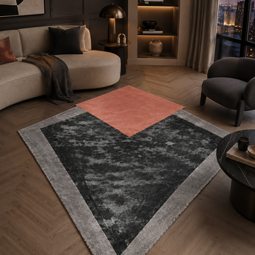Luxury geometric designer rug styled in a modern contemporary living room
