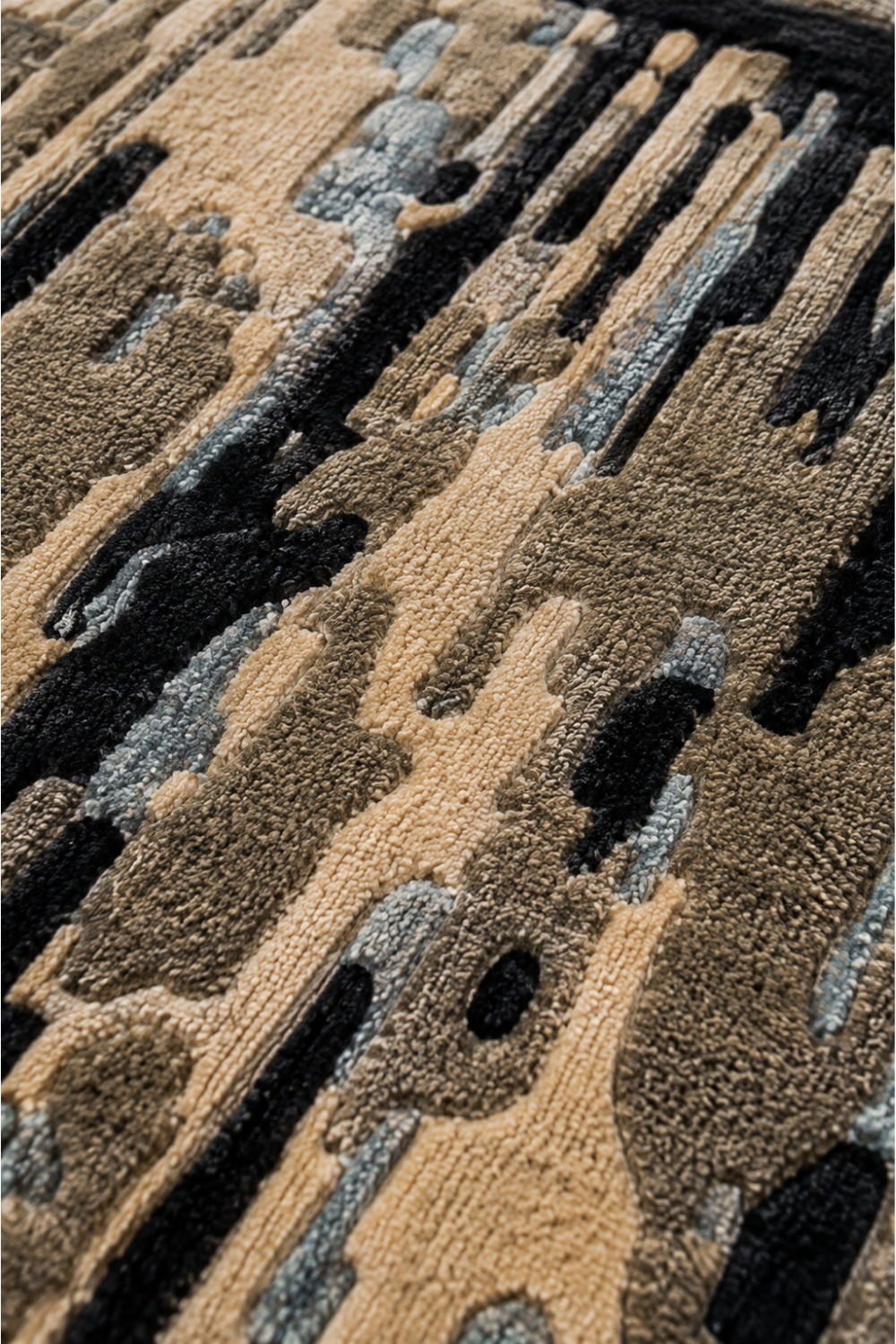 Complete Noir Structure hand-tufted abstract rug featuring charcoal, black, taupe, beige and muted blue-grey organic geometric detailing