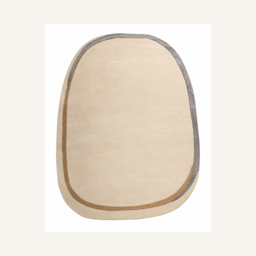 Minimal modern oval designer rug isolated on neutral background

