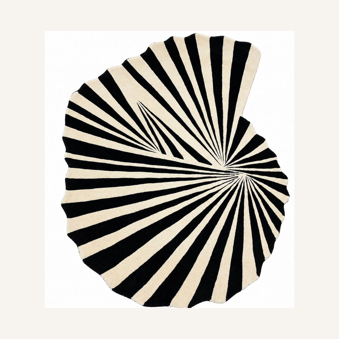 Black and ivory geometric luxury rug with radiant burst pattern isolated on white background
