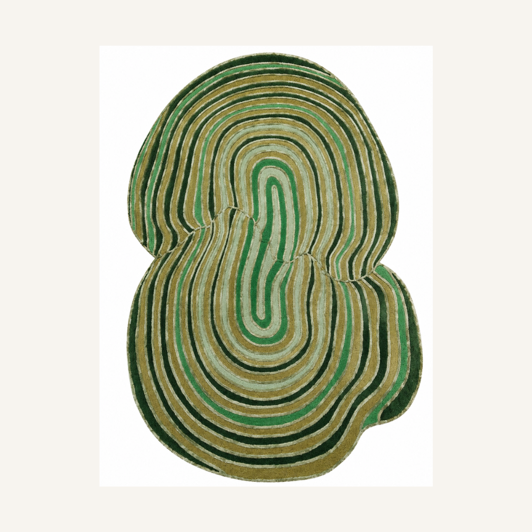 Green contour luxury hand tufted rug isolated on beige background
