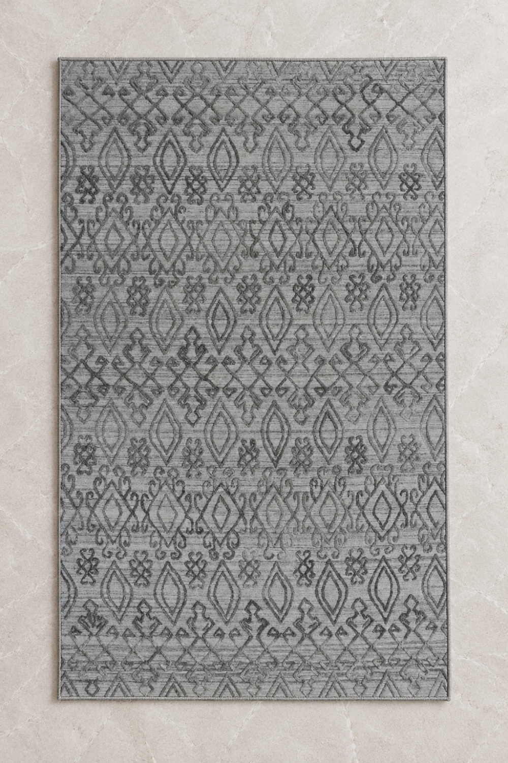 Ash Nomad luxury handloom over hand tufted New Zealand wool silver grey tribal area rug styled in a contemporary designer living room