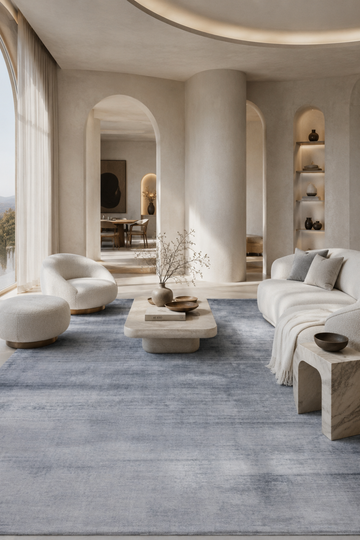 Azure Mist Handloom Plain Viscose rug styled in a contemporary luxury living room featuring soft powder blue tones and handcrafted washed texture.