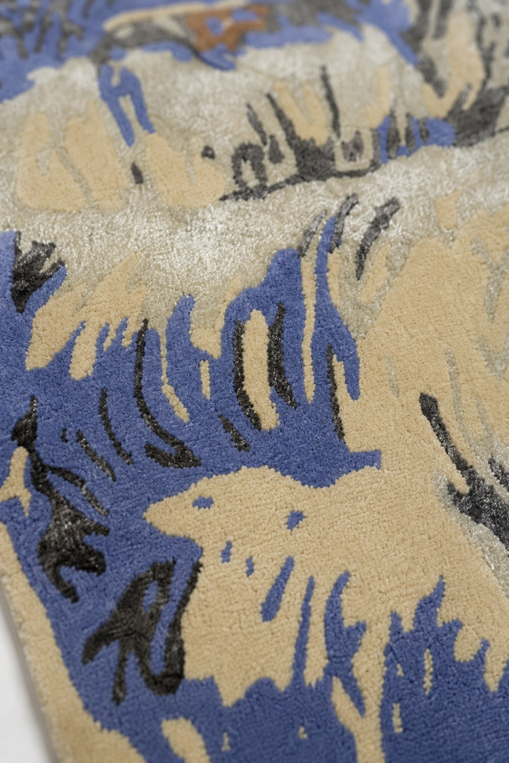Close-up texture detail of Azure Terrain abstract rug showcasing premium craftsmanship, luxury pile texture and artistic brushstroke design.