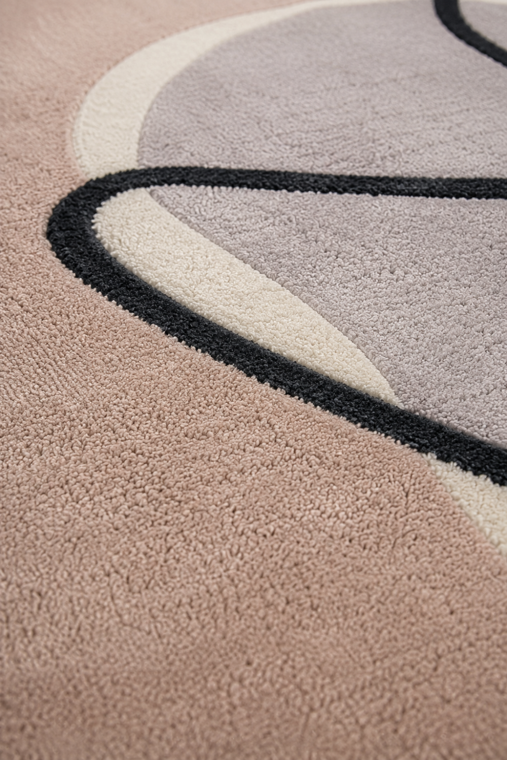 Close-up texture detail of Blush Contour abstract rug showcasing premium craftsmanship, soft pile texture and luxury finish.