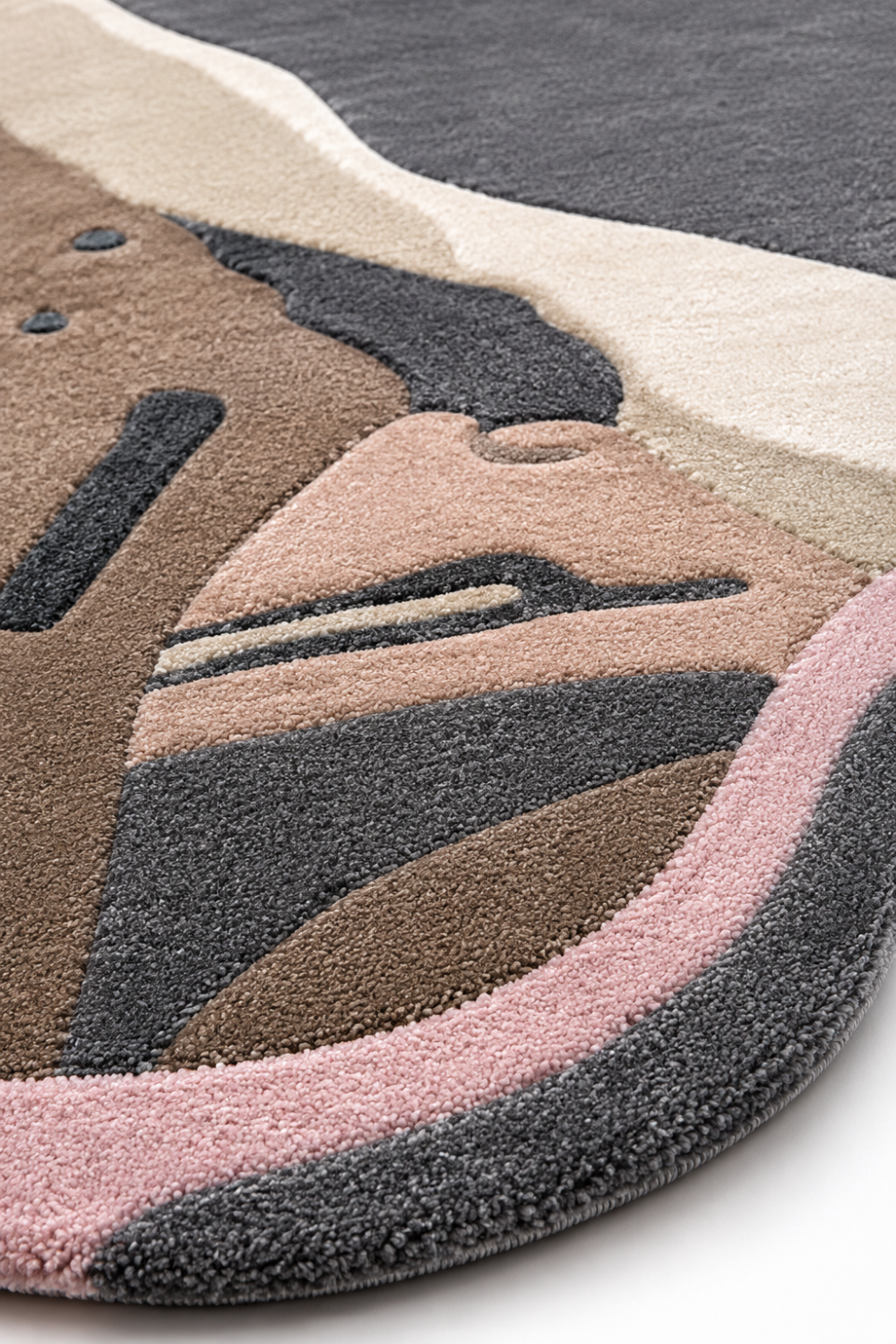 Close-up texture detail of Blush Eclipse luxury rug showing premium pile texture, abstract design and handcrafted appearance.