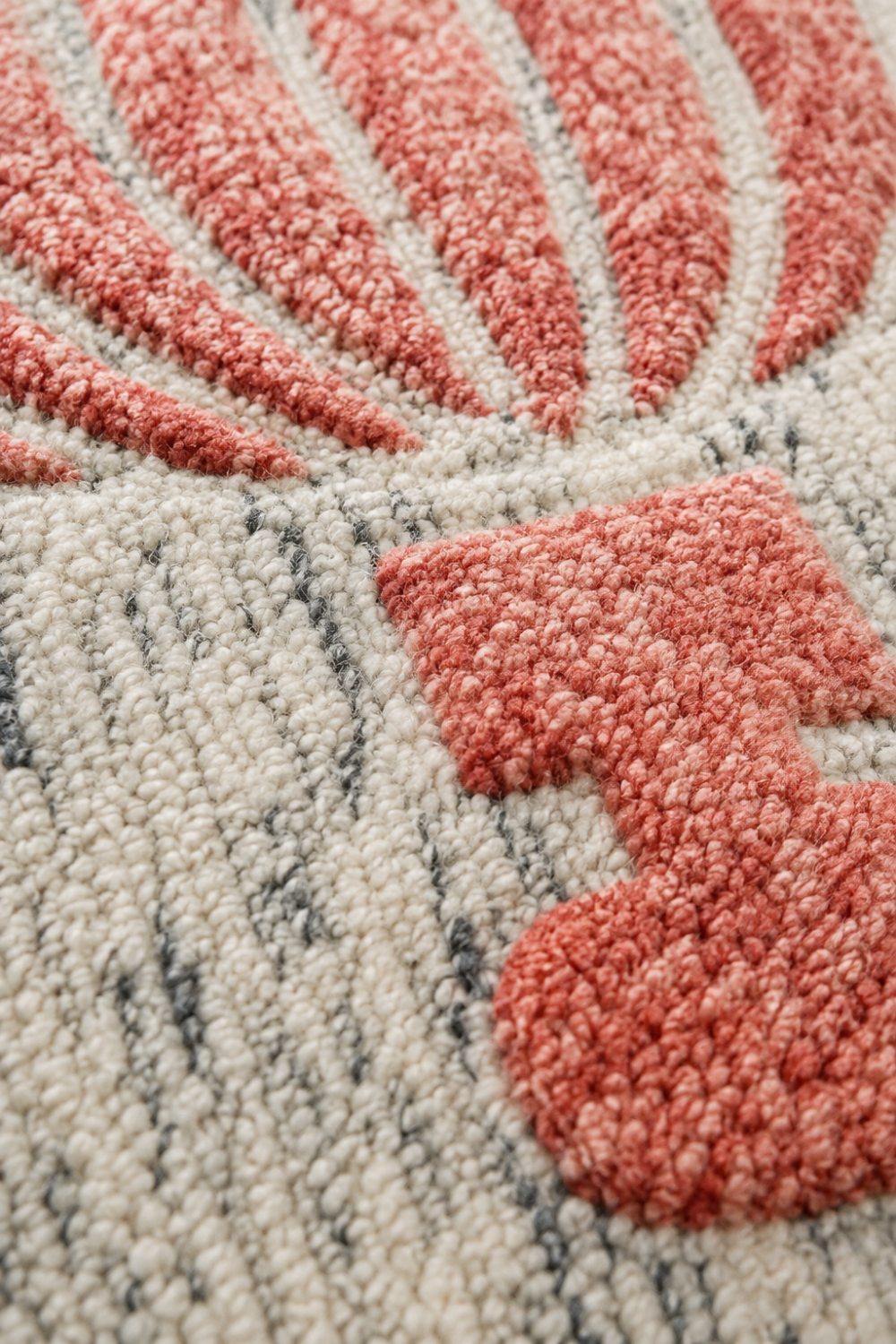 Close-up of the Coral Bloom Round Hand Tufted Rug highlighting carved pile, handcrafted texture and premium wool finish.