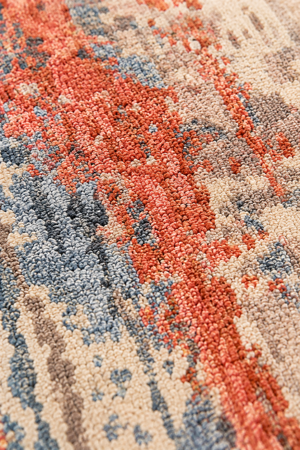 Close-up of the Coral Drift hand knotted wool and bamboo silk luxury rug highlighting intricate knot definition, premium fibers, and artisan craftsmanship.