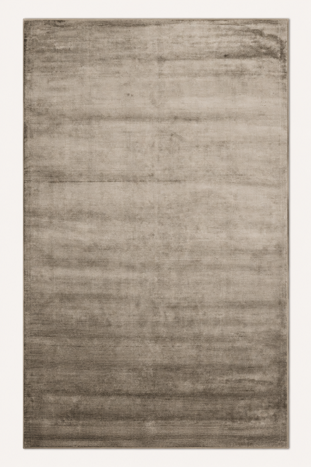 Dune Haven Handloom Plain Viscose rug featuring a warm greige colour with soft tonal movement and minimalist design.
