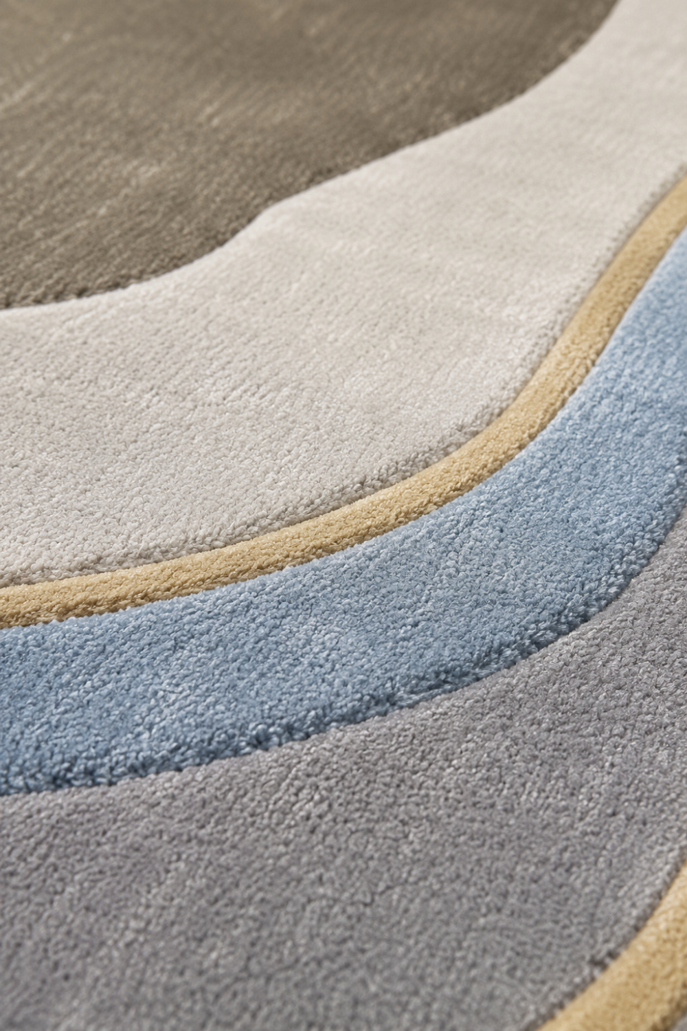 Close-up texture detail of Glacier Contour organic rug showcasing premium pile texture, layered contours and luxury craftsmanship.