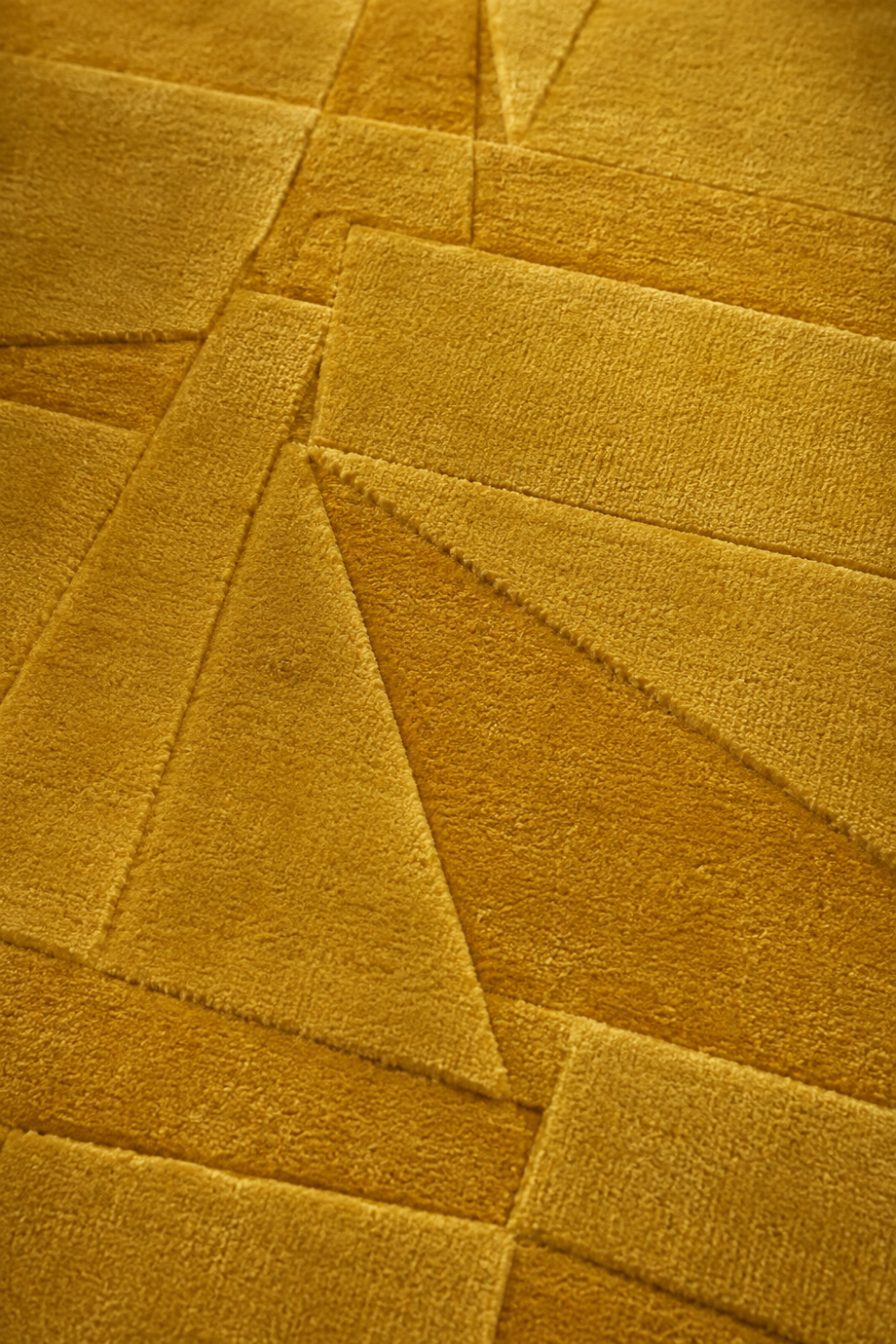 Close-up of the Golden Mosaic Rug showing carved mosaic-inspired geometric detailing, raised texture, and luxurious Handloom Viscose Tencel Bamboo craftsmanship.