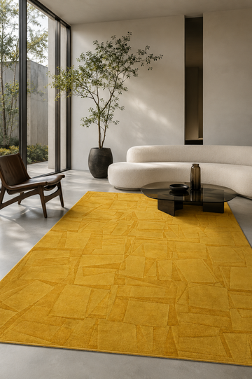 Golden handloom rug in a modern interior, featuring refined geometric texture and handcrafted detail