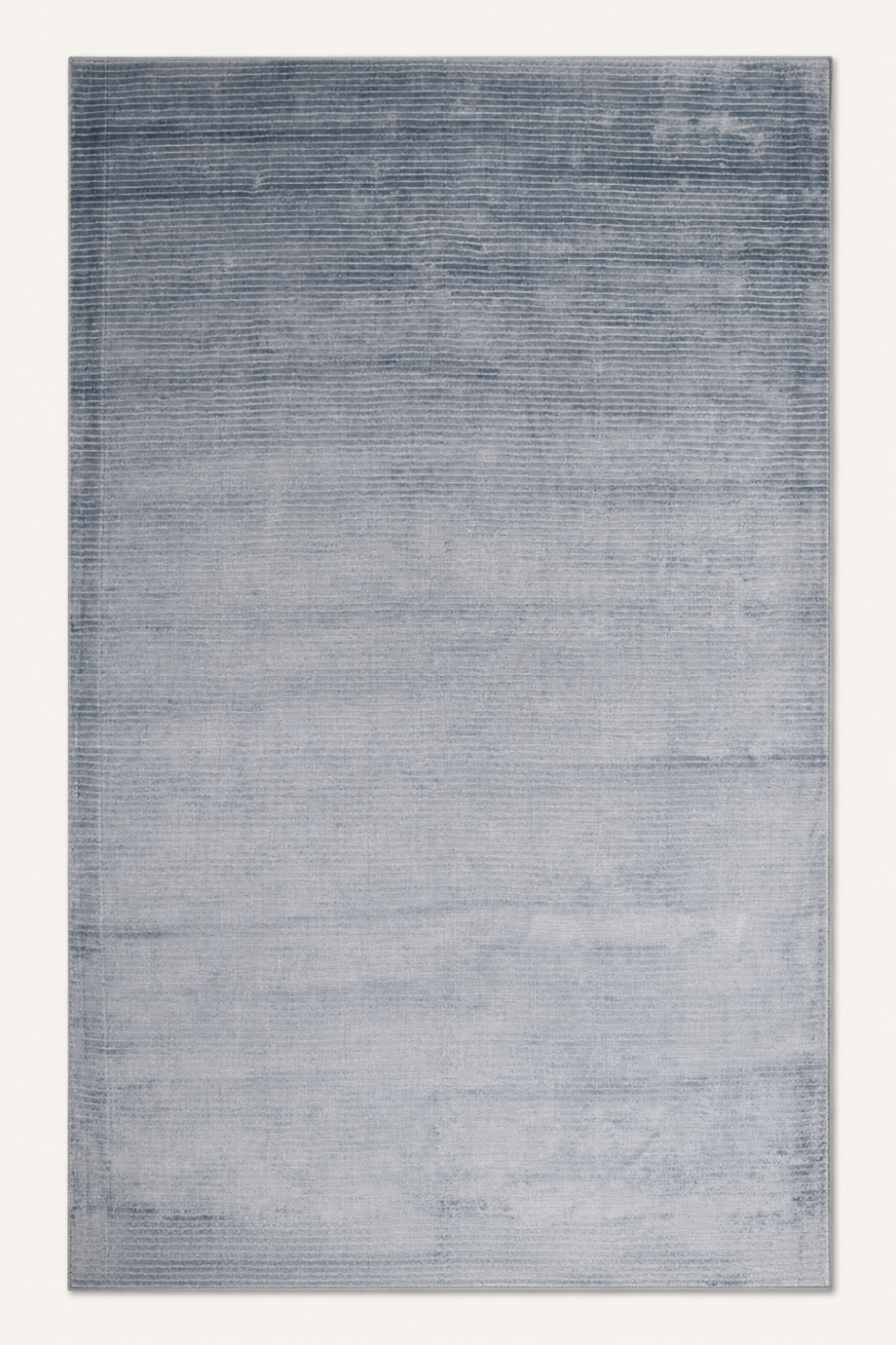 Harbor Sky Handloom Plain Viscose rug featuring a powder blue colour, subtle tonal movement, and minimalist handcrafted design.
