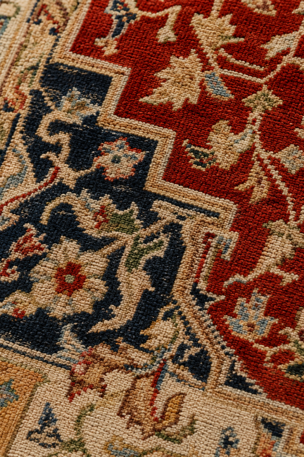 Close-up texture of the Imperial Heriz Traditional Persian Area Rug showcasing detailed woven craftsmanship, rich brick red and deep navy colours, and intricate floral patterns.
