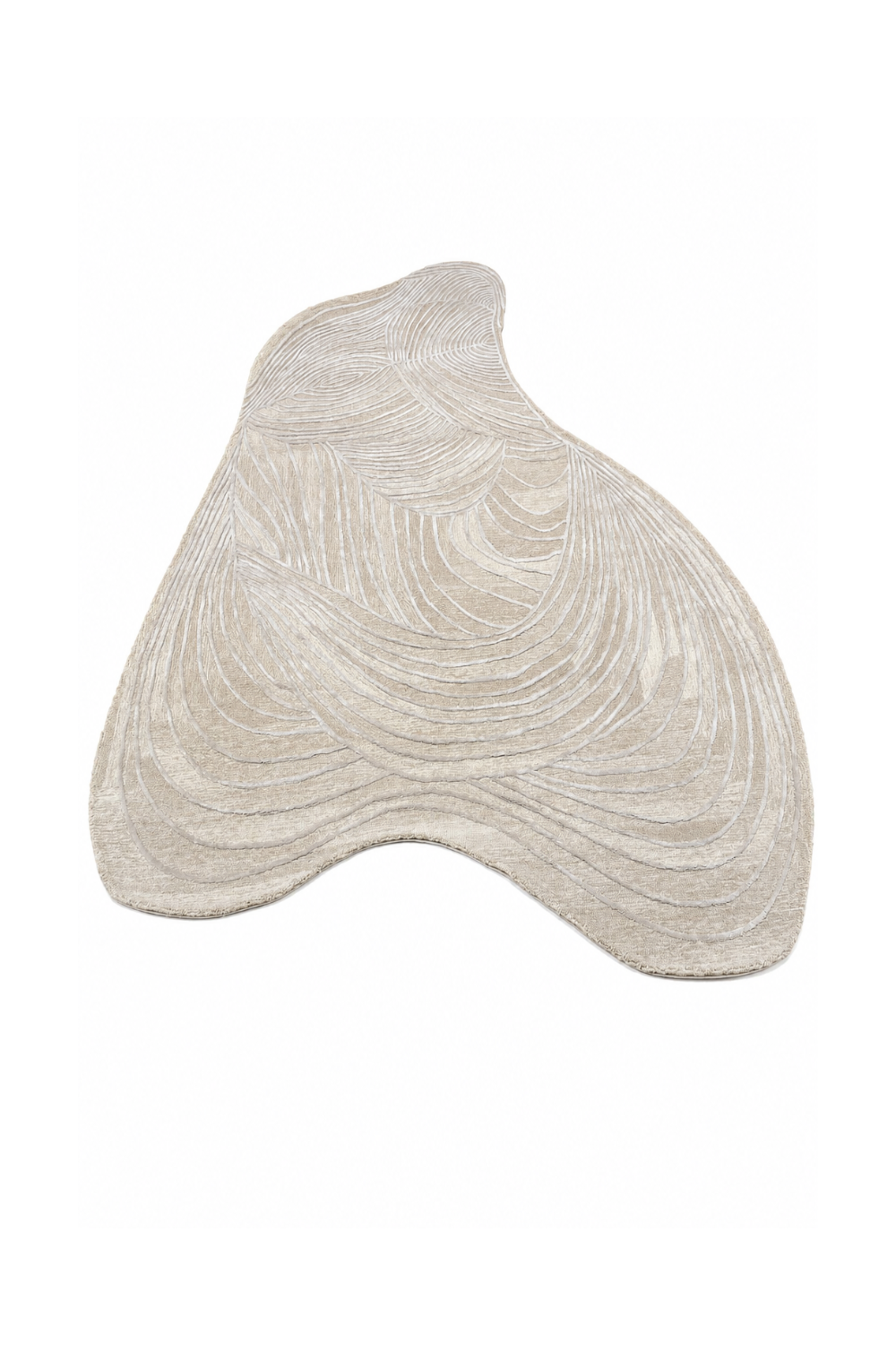 Top view of Ivory Crest luxury organic rug showcasing freeform shape and sculpted contour line design.