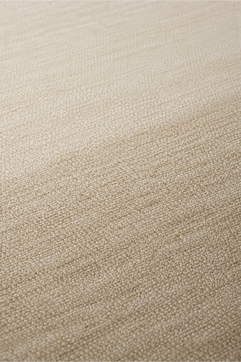 Close-up of the Ivory Essence handloom New Zealand wool rug showcasing its handcrafted weave, premium wool texture and soft ivory finish