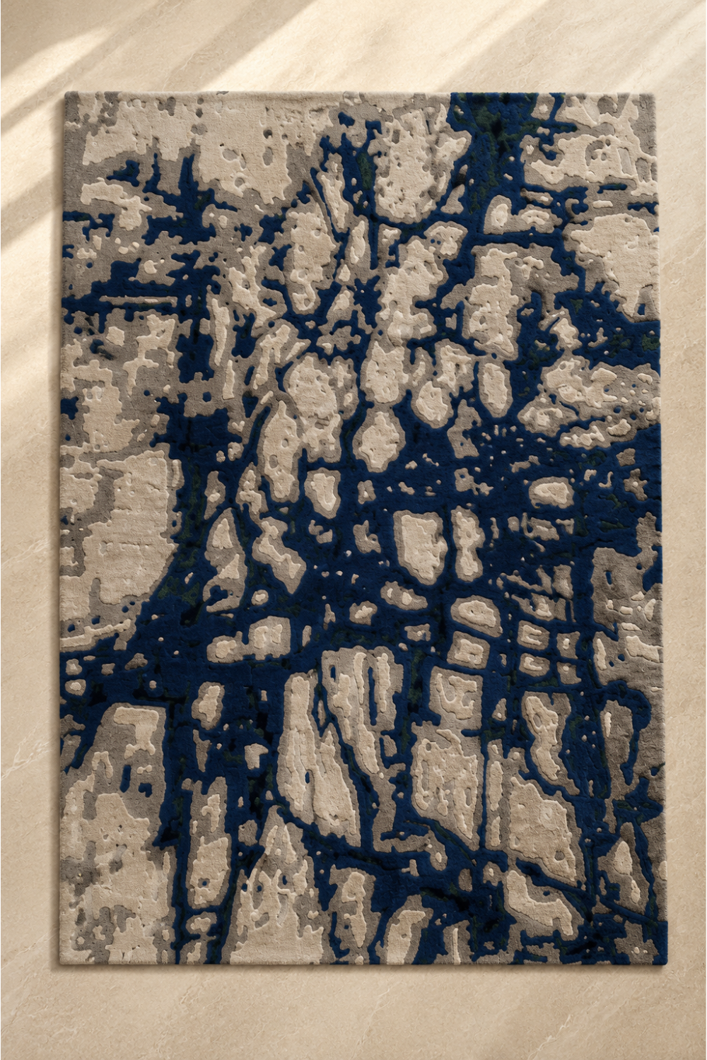 Midnight Current abstract rug in deep navy blue, ivory, stone grey and subtle green