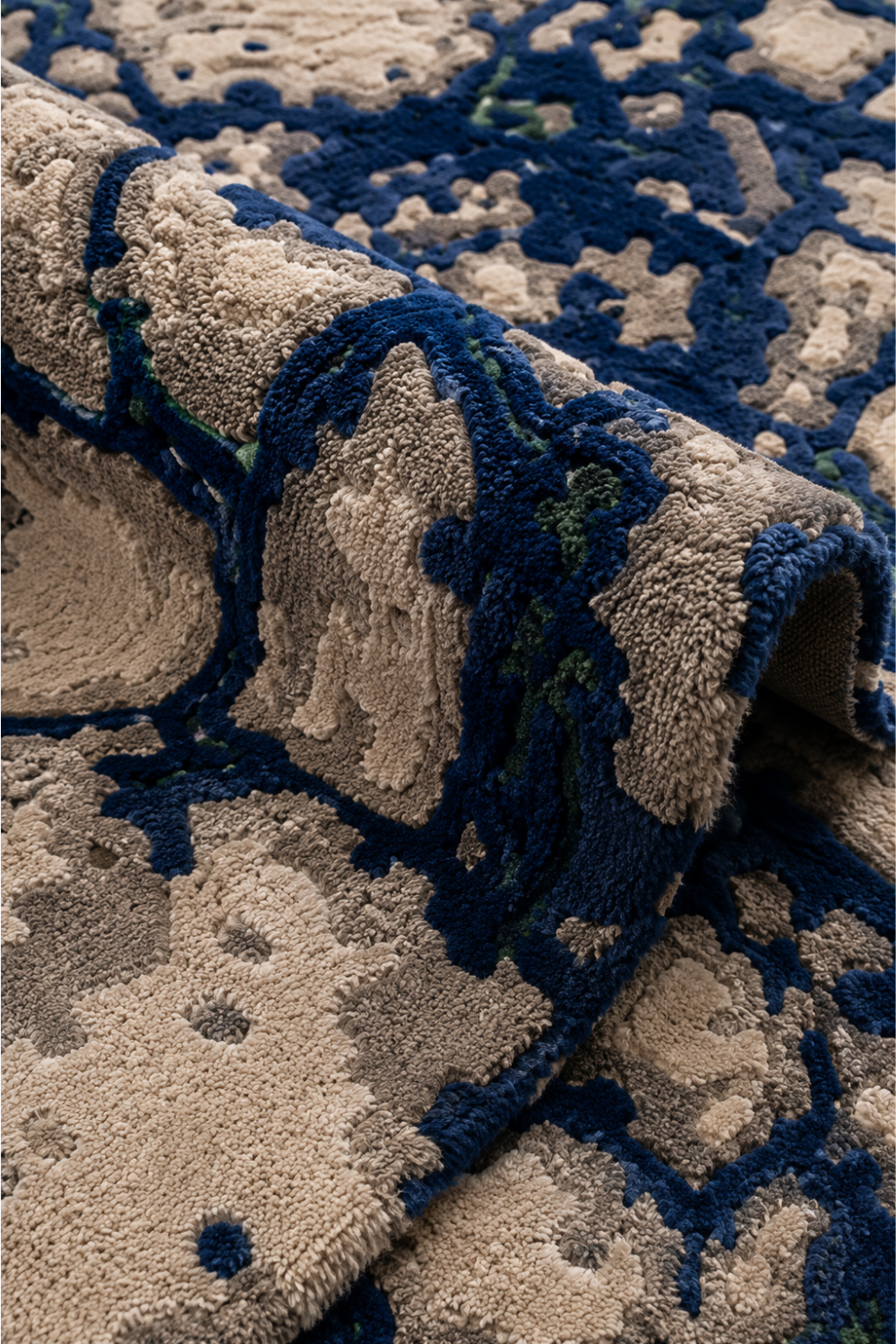Close-up of Midnight Current abstract rug showing dimensional textured pile in navy, ivory and grey