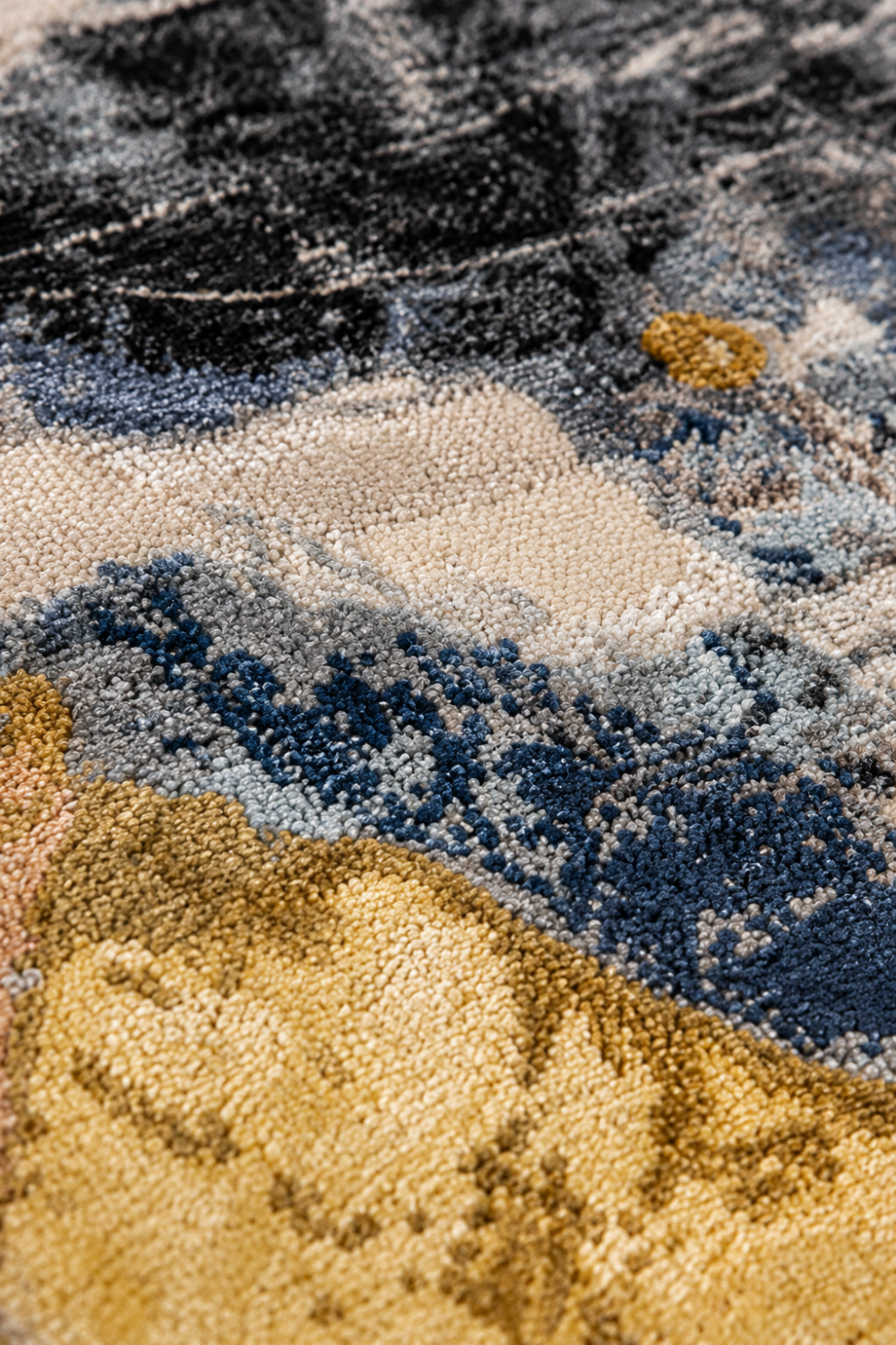 Close-up texture of the Midnight Horizon hand knotted wool and bamboo silk luxury rug highlighting intricate knot definition, premium fibers, and artisan craftsmanship.