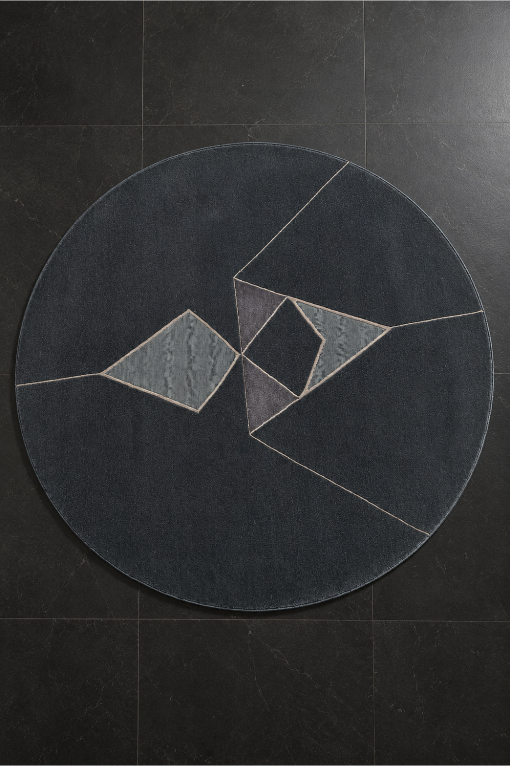 Midnight Prism Round Hand Knotted Rug featuring a charcoal black base with geometric diamond motifs in grey and ivory.