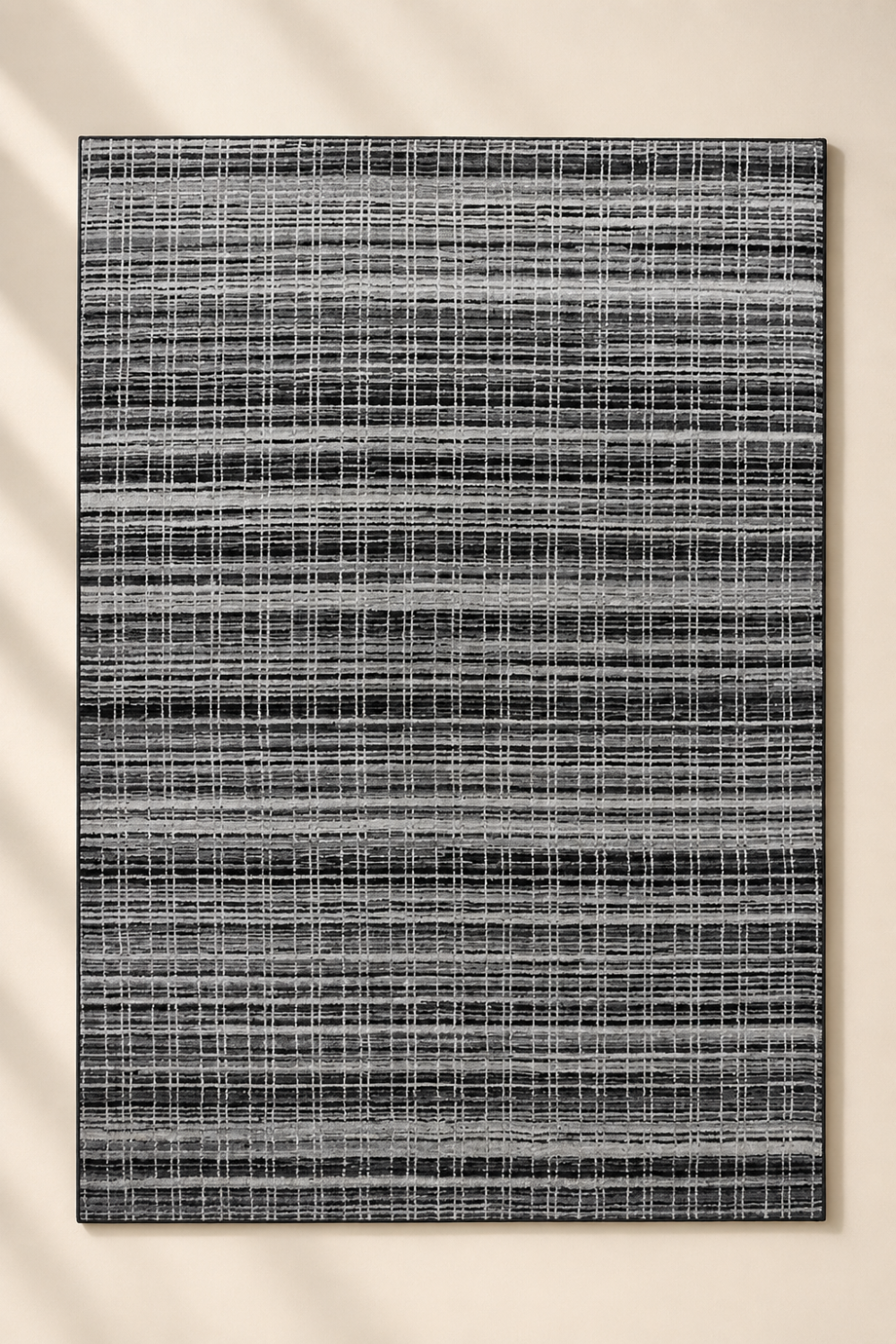 Midnight Weave handloom New Zealand wool and viscose contemporary area rug featuring a woven linear grid pattern in charcoal black grey and ivory