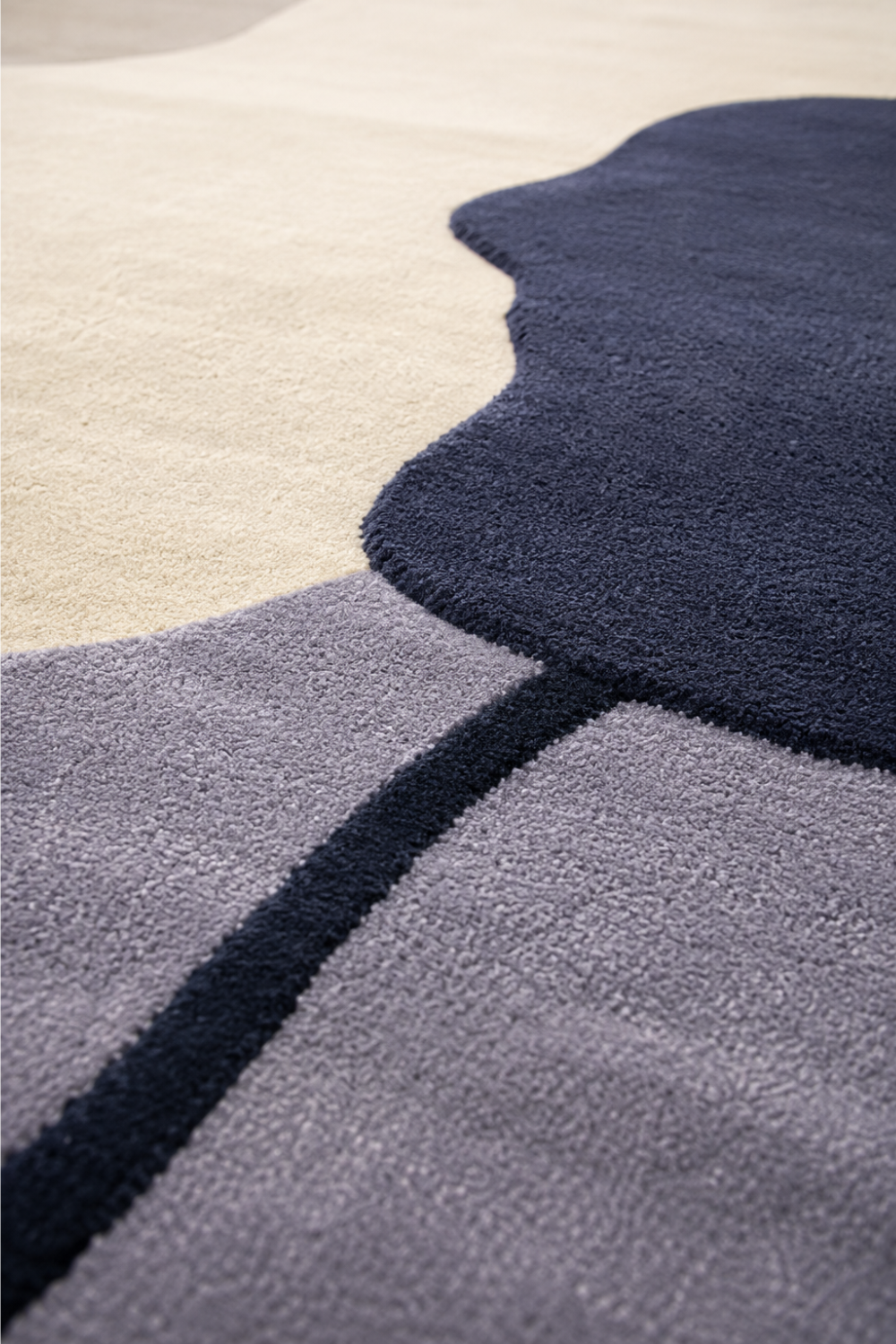Close-up detail of Moonstone Abstract Organic Rug showcasing premium handcrafted texture, soft pile and luxury finishing.