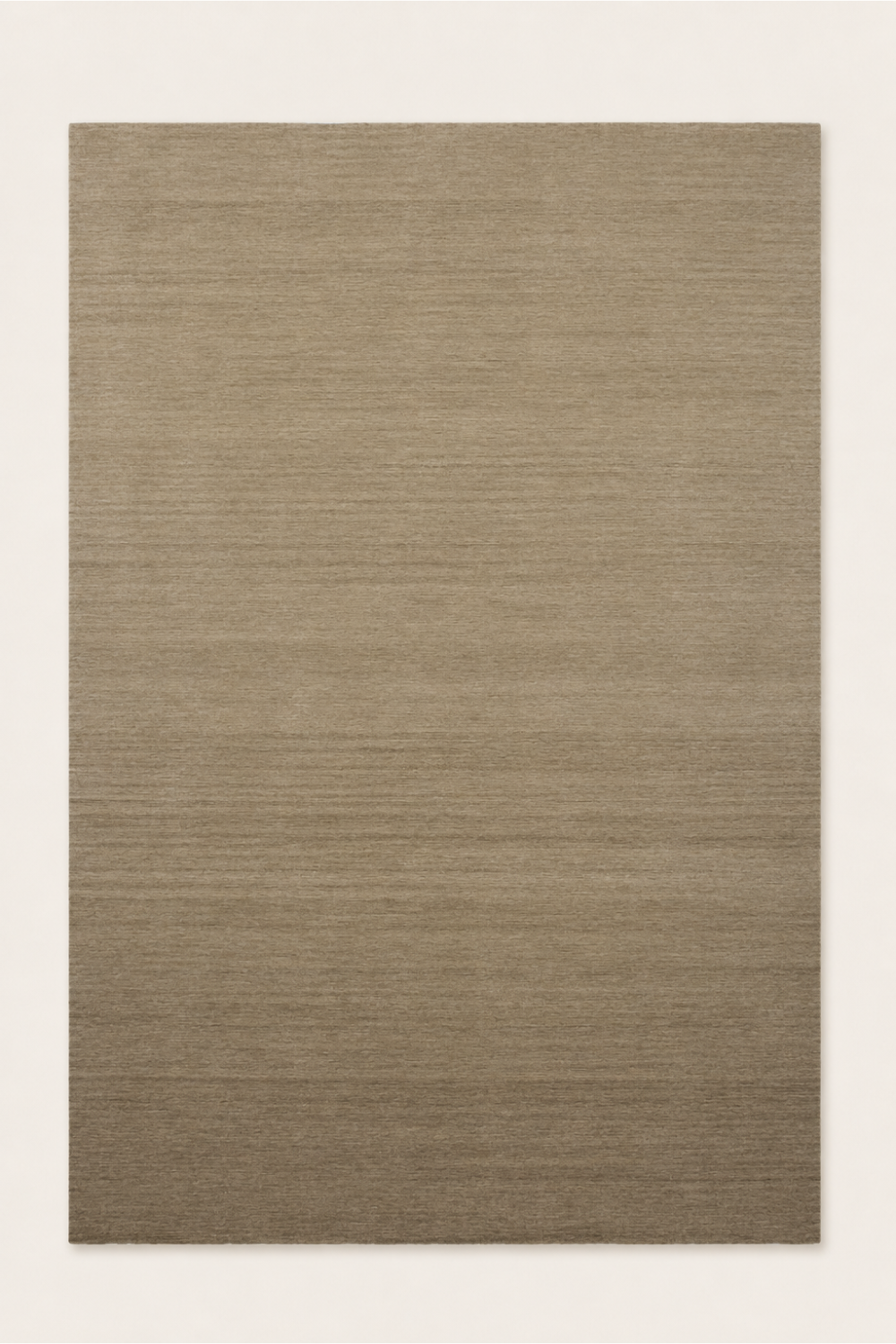 Oat Horizon luxury handloom New Zealand wool rug featuring soft tonal shading and warm neutral colours styled in a luxury contemporary library