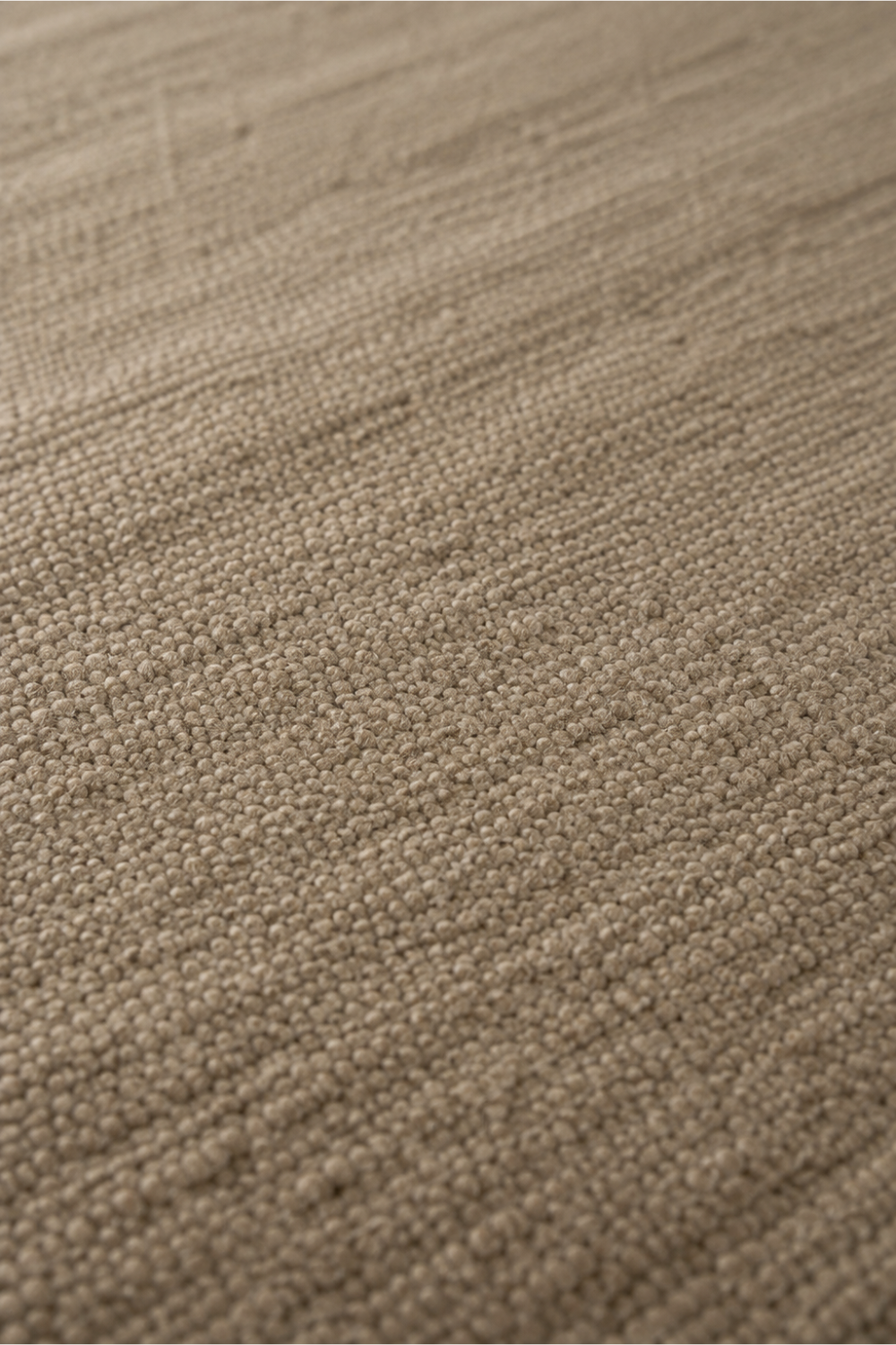 Close-up of the Oat Horizon handloom New Zealand wool rug showcasing handcrafted texture, continuous tonal shading and premium woven finish
