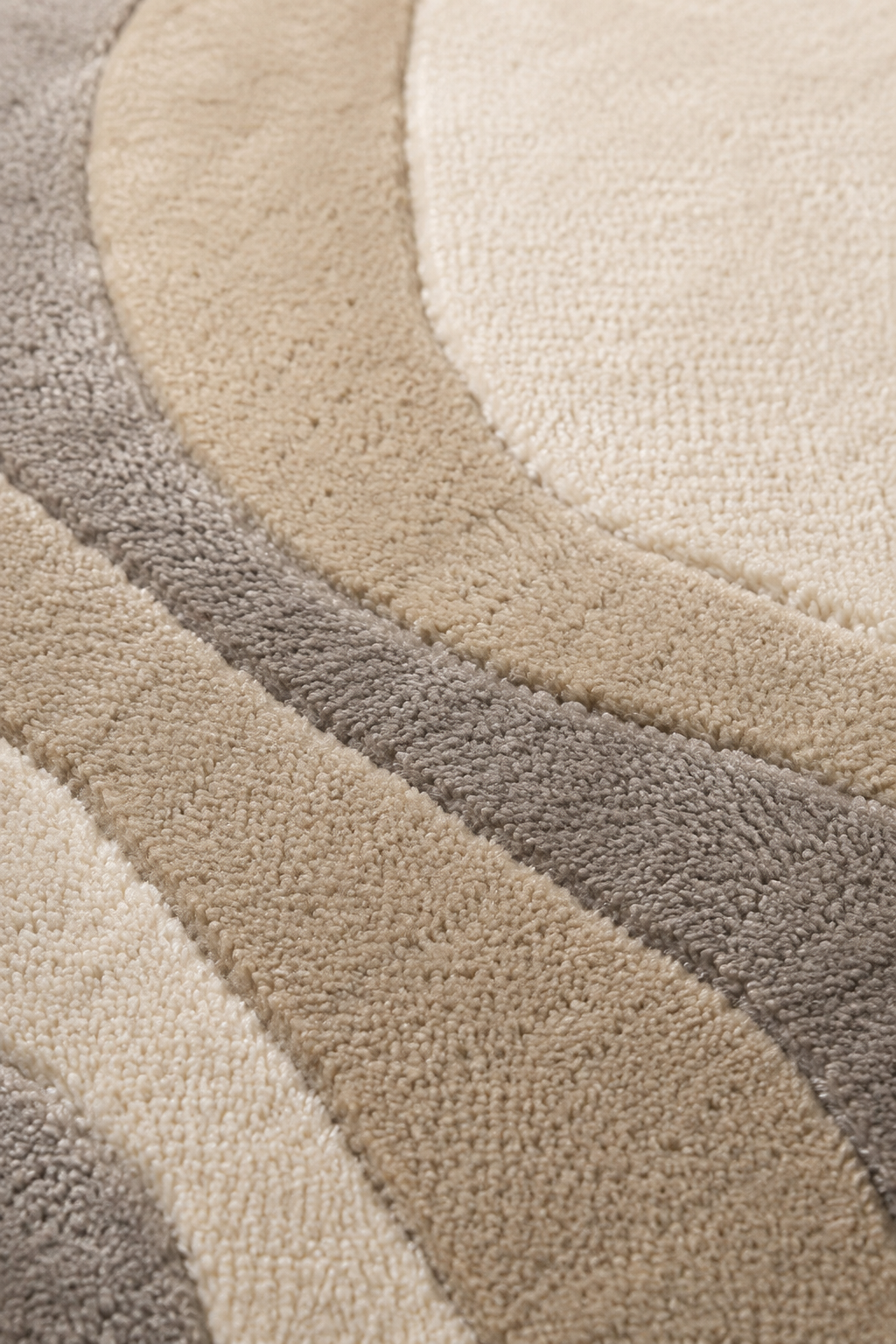 Close-up of Organic Contour Hand Tufted Irregular Rug showing plush texture and layered tonal contours