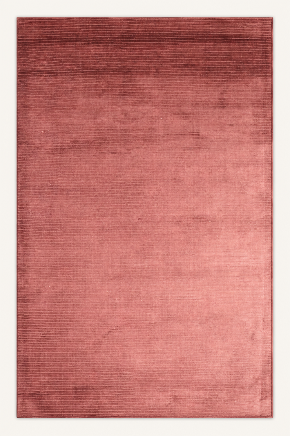 Rose Ember Handloom Plain Viscose rug featuring a dusty rose colour with refined handcrafted horizontal texture.