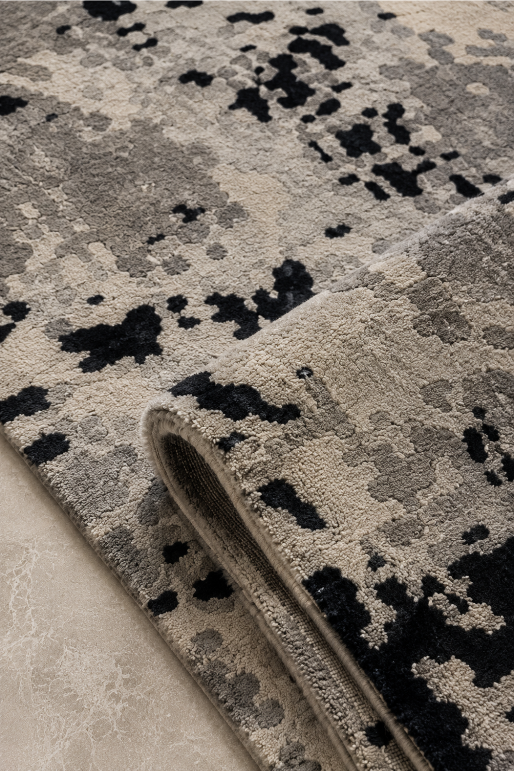 Close-up texture of Shadow Fragment hand-tufted abstract rug