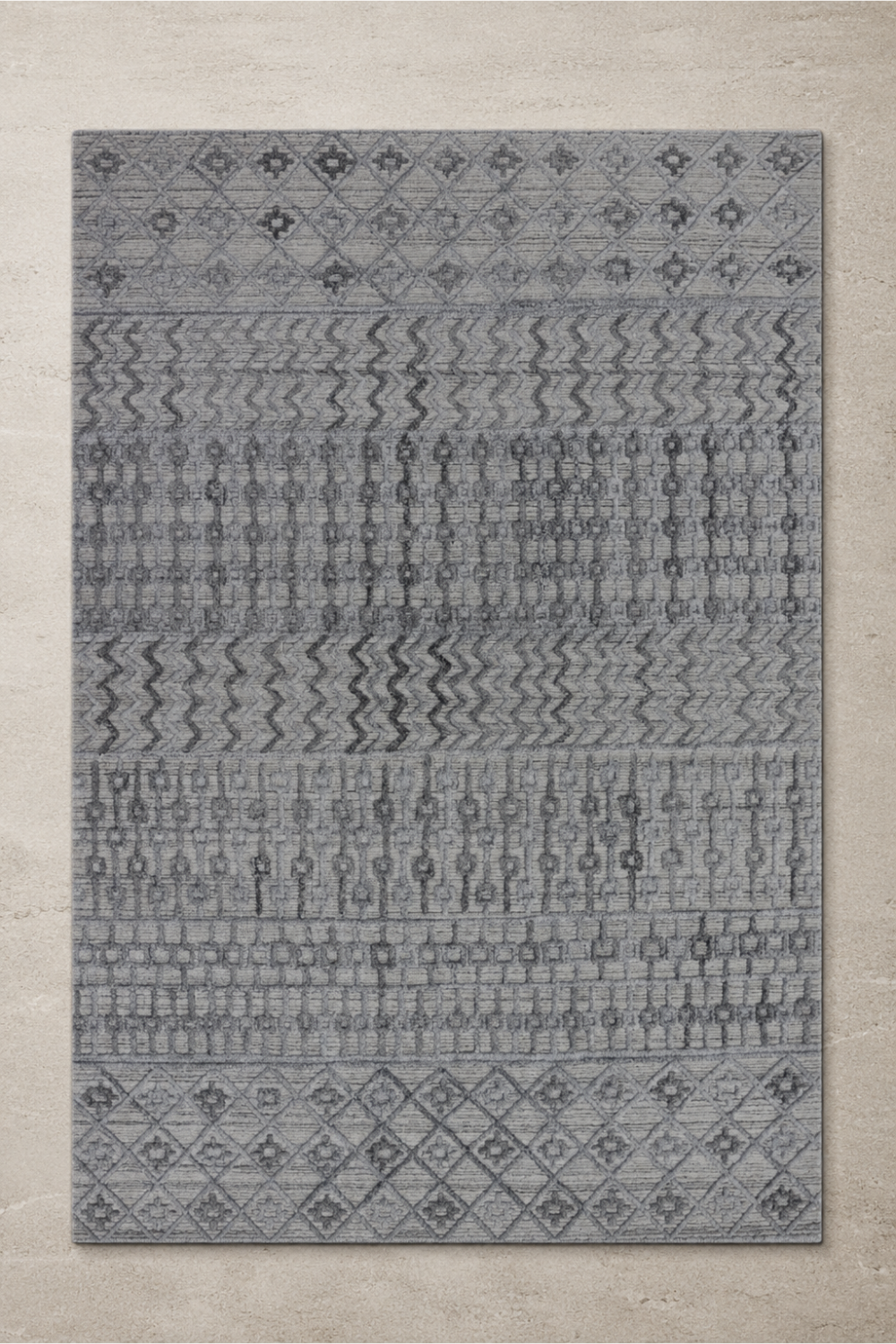Silver Mosaic handcrafted handloom over hand tufted silver grey New Zealand wool area rug featuring carved tribal geometric bands and diamond motifs