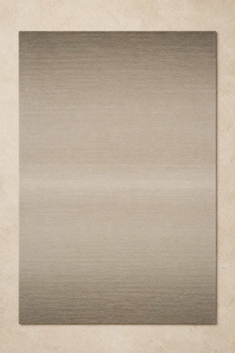 Stone Haven luxury handloom New Zealand wool greige ombre area rug styled in a contemporary luxury living room with warm wood interiors.