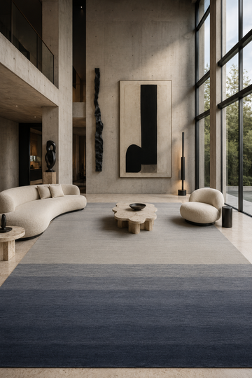 Stone Horizon luxury handloom New Zealand wool gradient area rug styled in a contemporary minimalist living room