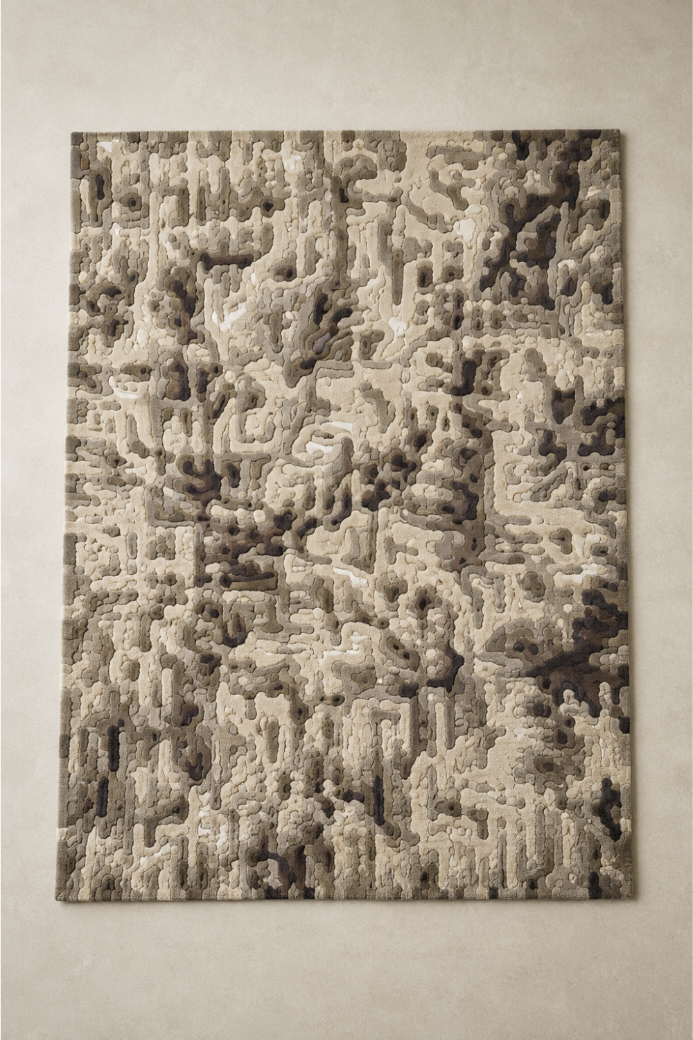 Complete Stone Terrain hand-tufted abstract rug featuring ivory, cream, taupe, greige and earthy brown organic forms