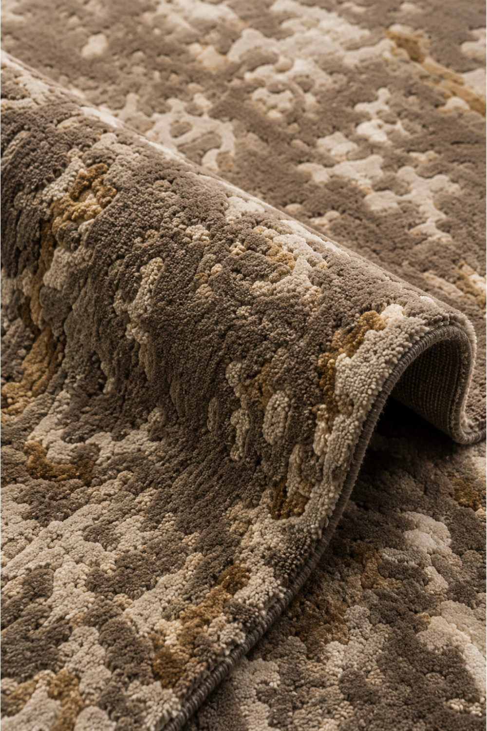 Close-up of Stone Veil abstract rug showing raised textured pile and tonal detailing