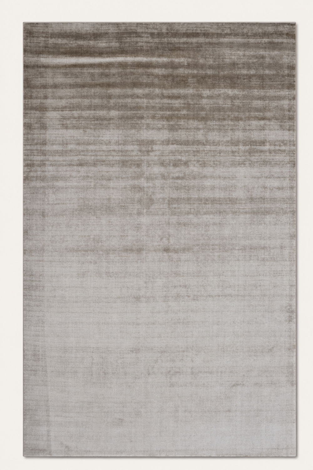 Stone Veil Rug handcrafted handloom viscose area rug in warm greige with soft horizontal tonal variations and minimalist design.