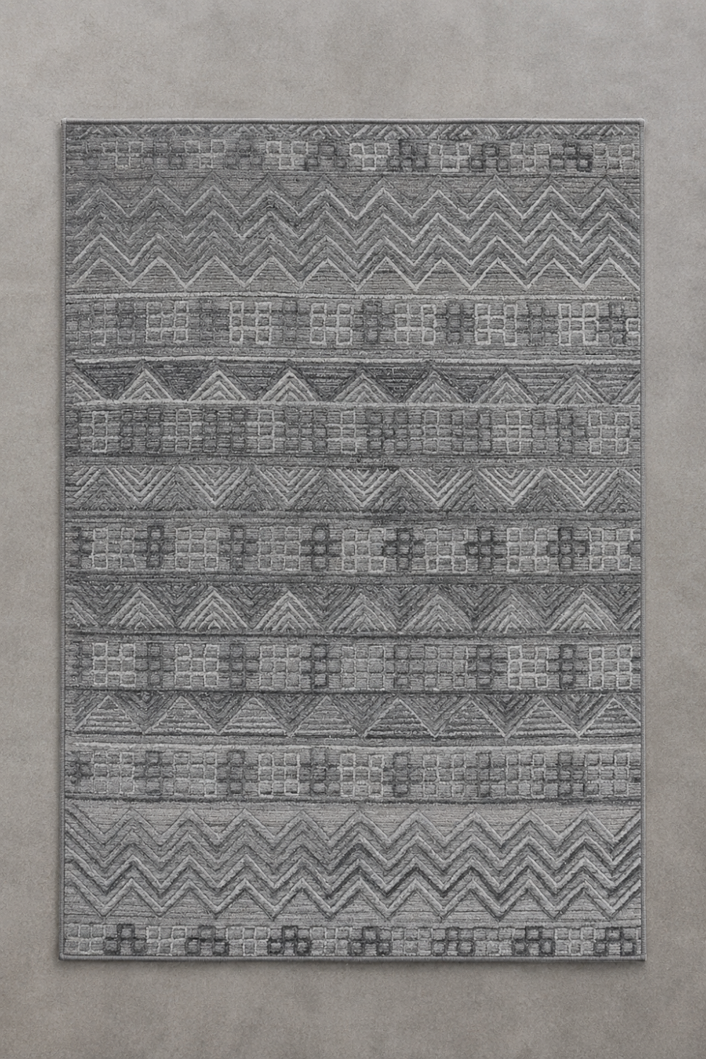 Summit Echo handcrafted handloom over hand tufted charcoal grey New Zealand wool area rug featuring carved geometric tribal stripe patterns