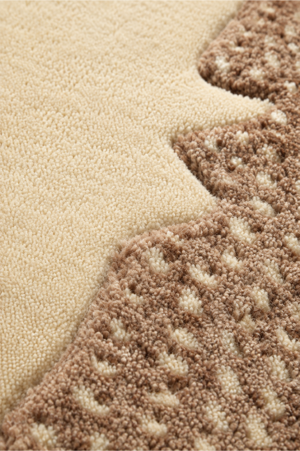 Close-up of the Terra Halo Round Hand Tufted Rug showcasing plush pile, carved detailing and handcrafted texture.