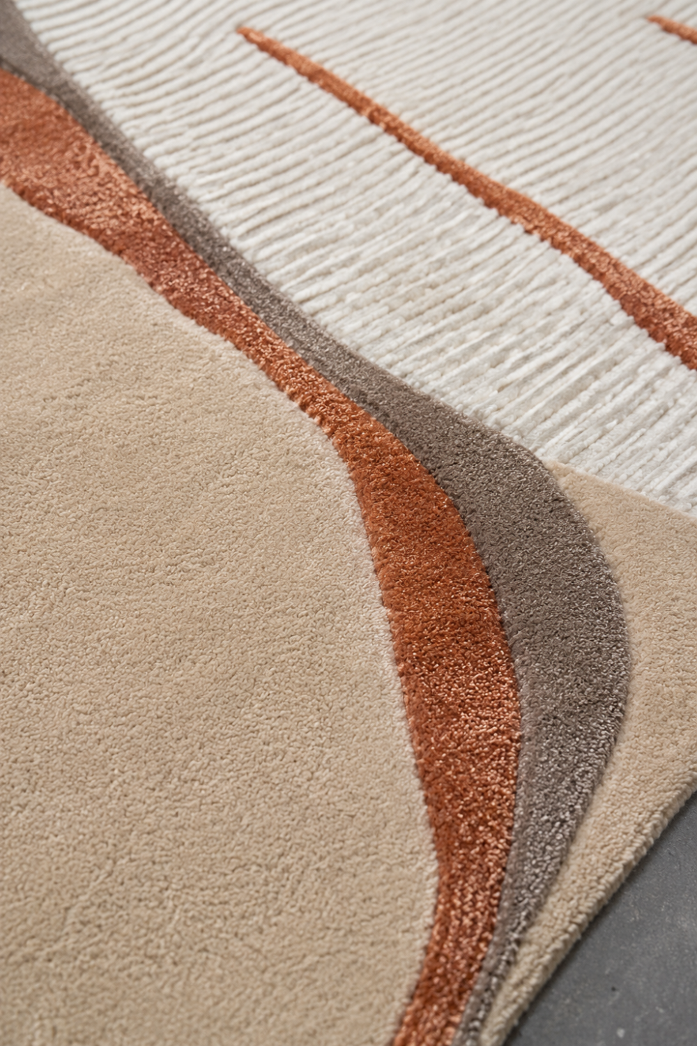 Close-up detail of Terracotta Dune rug highlighting carved texture, premium pile construction and artisan craftsmanship.