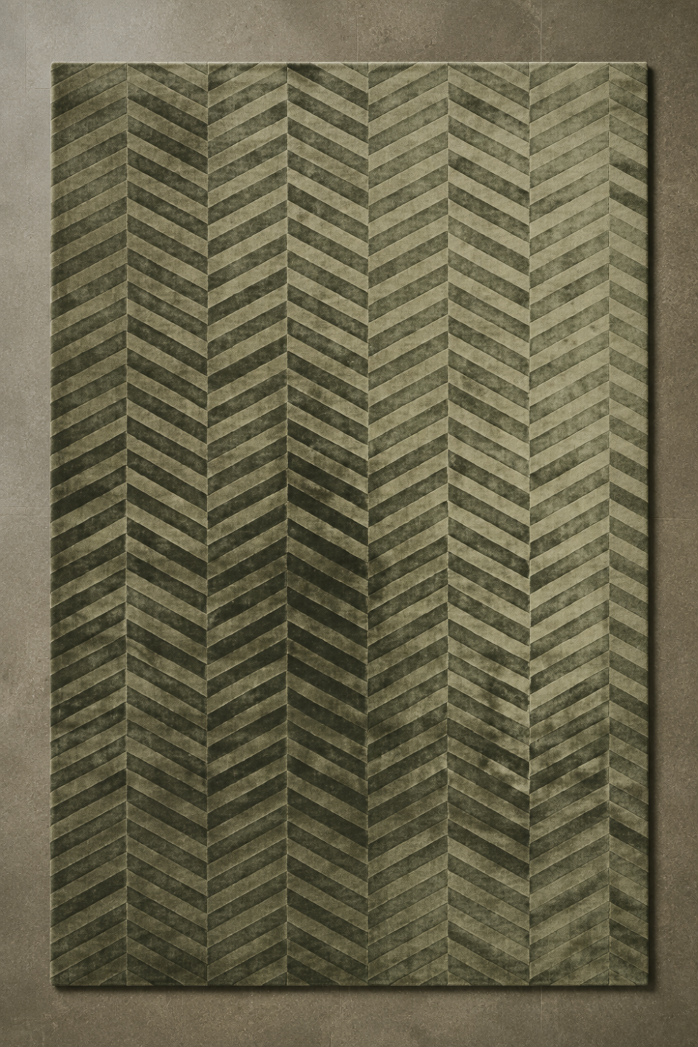 Verdant Chevron Rug in Handloom Viscose Tencel Bamboo styled in a luxury indoor-outdoor living space featuring an embossed olive green chevron pattern.