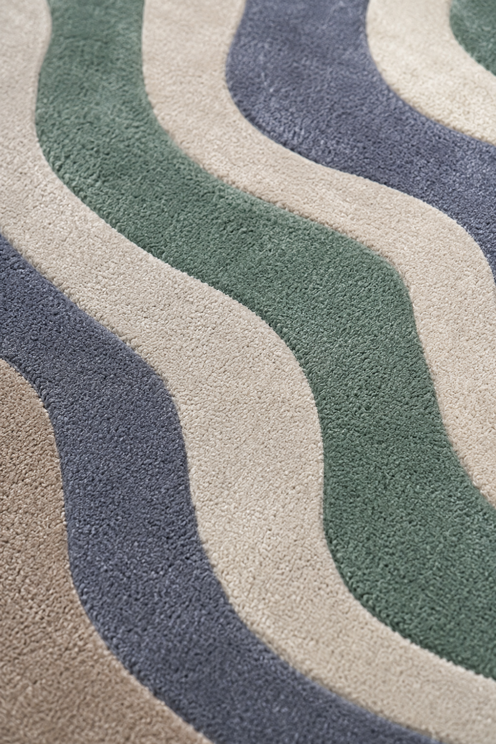 Close-up texture detail of Verdant Contour designer rug showcasing premium pile, soft contour lines and handcrafted finish.