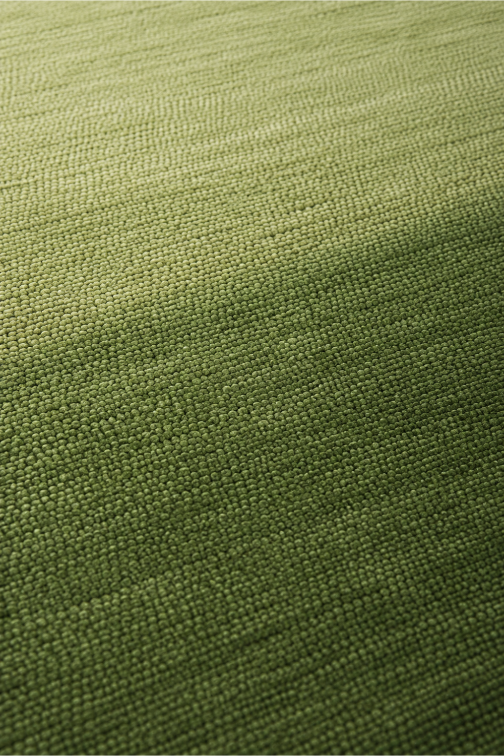 Close-up of the Verdant Horizon handloom New Zealand wool rug showcasing handcrafted weave, premium wool texture and green gradient colour transition